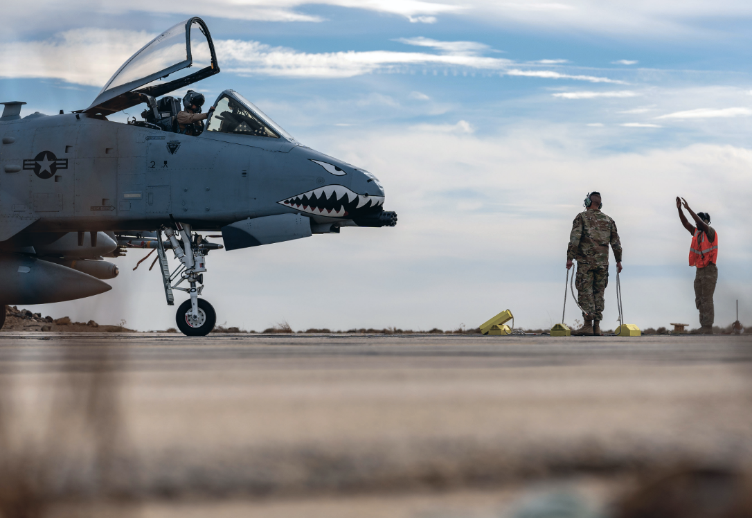 Air Force crew chiefs marshal A-10C Thunderbolt II during Agile Combat Employment exercise in austere location within U.S. CentralCommand area of responsibility, December 11, 2024 (U.S. Air Force)